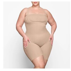 NWT- Skims Sheer Sculpt open bust Mid Thigh Sheer Bodysuit SH-BSS-0014